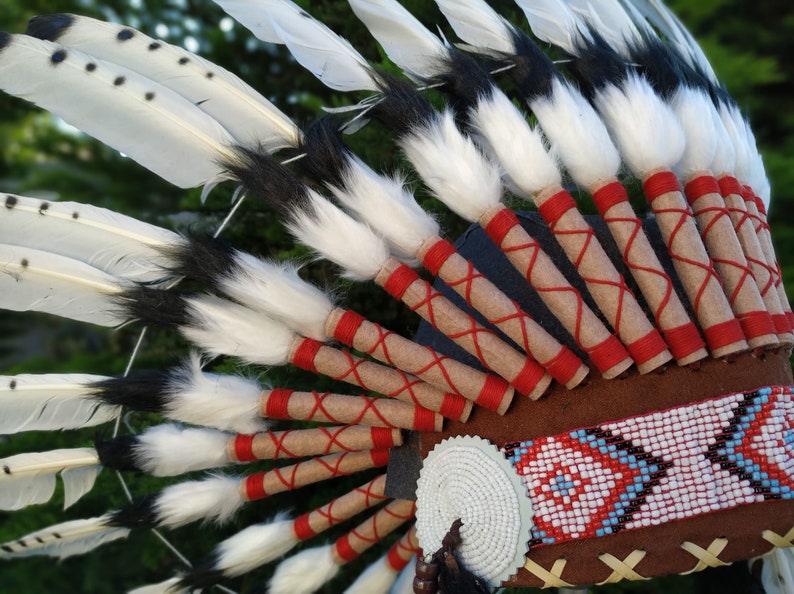 Short Indian Headdress Replica made with Black painted White Swan feathers with white beadwork in the front