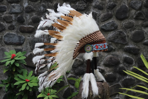 Short Orange Indian Headdress Replica made with Orange swan feathers and fabric band on the front