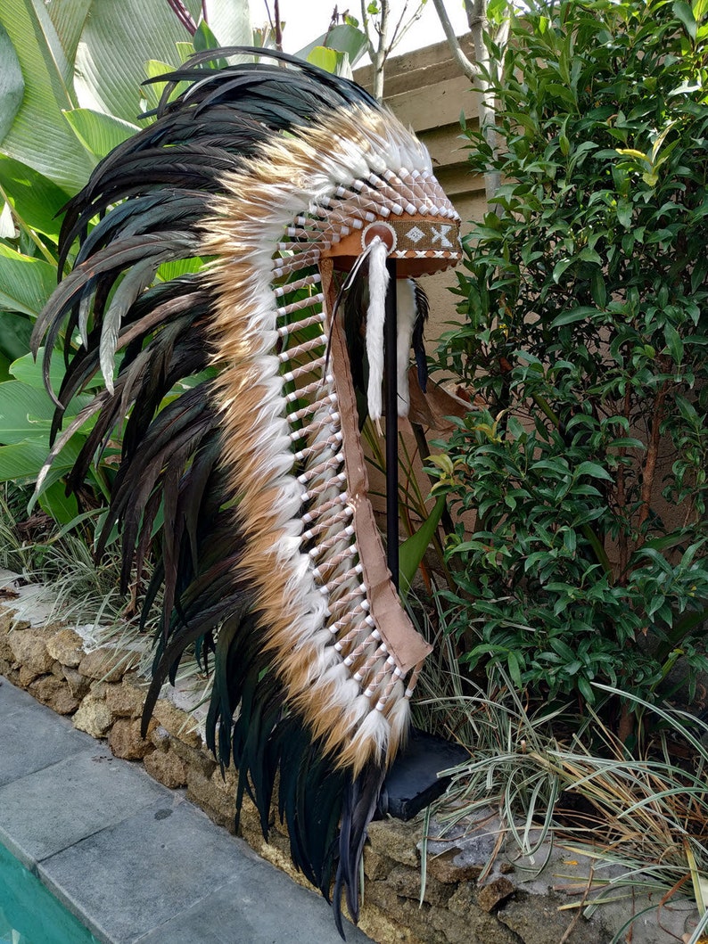 Long Brown Indian Headdress Replica made with real rooster feathers and brown and white fur and gold beaded work in the front image 1