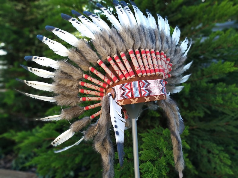 Short Indian Headdress Replica made with Black painted White Swan feathers with white beadwork in the front