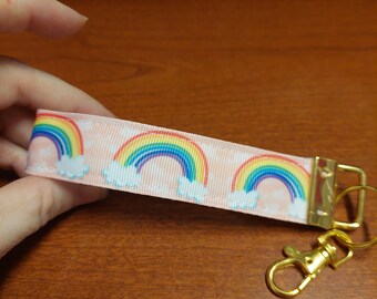 Rainbow wristlet, zipper pull, charm, on white poly strapping, kawaii