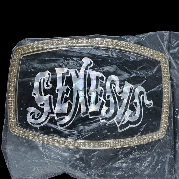 Pacifica belt buckles top