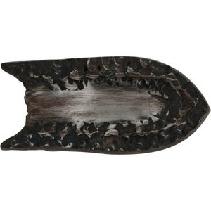 May include: A decorative, oblong-shaped tray with a distressed, textured appearance. The tray features a dark, rough border surrounding a lighter, metallic-looking center. The edges have an uneven, chipped design, adding to its rustic charm.