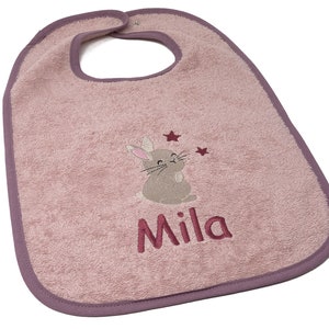 Bib with embroidered press stud name and bunny motif