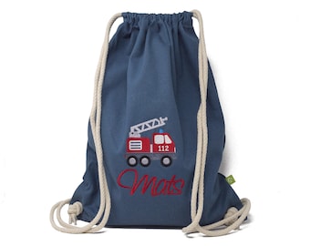 Gym bag embroidered with name and fire department car motif