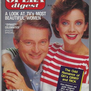 May include: A February 12, 1985 issue of Soap Opera Digest magazine featuring a cover with a man and a woman. The text reads Soap Opera Digest, How To Have Your Own Soap Opera Romance!, A Look At TV's Most Beautiful Women, and The Odd Romance of GH's Ginny and Rick.