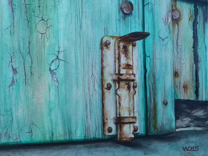 May include: A rusty metal latch on a weathered turquoise wooden door. The door has cracks in the paint and is showing signs of age.
