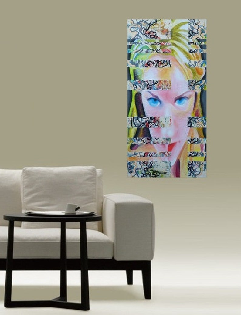 May include: Abstract portrait of a woman with blue eyes, her face is partially obscured by colorful, patterned strips. The background is a light beige.