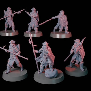 May include: Six gray plastic miniature figures of warriors wearing helmets and holding spears and shields. The figures are standing on round bases.
