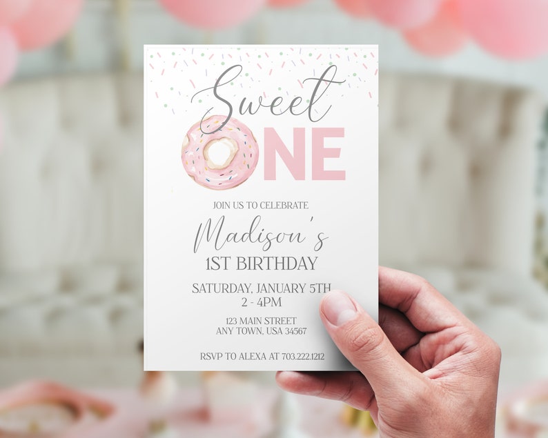 May include: Pink and white donut-themed first birthday party invitation with the text "Sweet One" and "Madison's 1st Birthday". The invitation includes the date, time, address, and RSVP information.