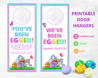 Peut inclure: Porte-manteaux de porte imprimables pour Pâques. Le motif représente un lapin tenant des œufs de Pâques colorés avec le texte "You've Been Egged!" et "We've Been Egged! Happy Easter".