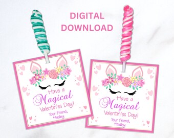 May include: Two pink and gold unicorn Valentine's Day cards with a pink and white swirl lollipop on top. The cards say "Have a Magical Valentine's Day! Your Friend, Hadley".