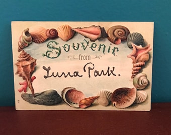 Vintage Postkarte, Souvenir aus dem Luna Park, Nummer 68, Prägekarte, Luna Park, Muscheln, Meeresküste, Vergnügungspark