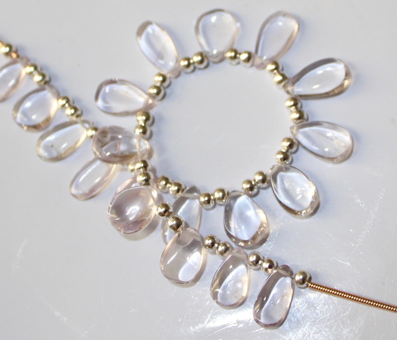 6x11.5-7x12.5mm Low price M-3777 Wholesale Price 19 piece white Amethyst Smooth pear briolette Beads