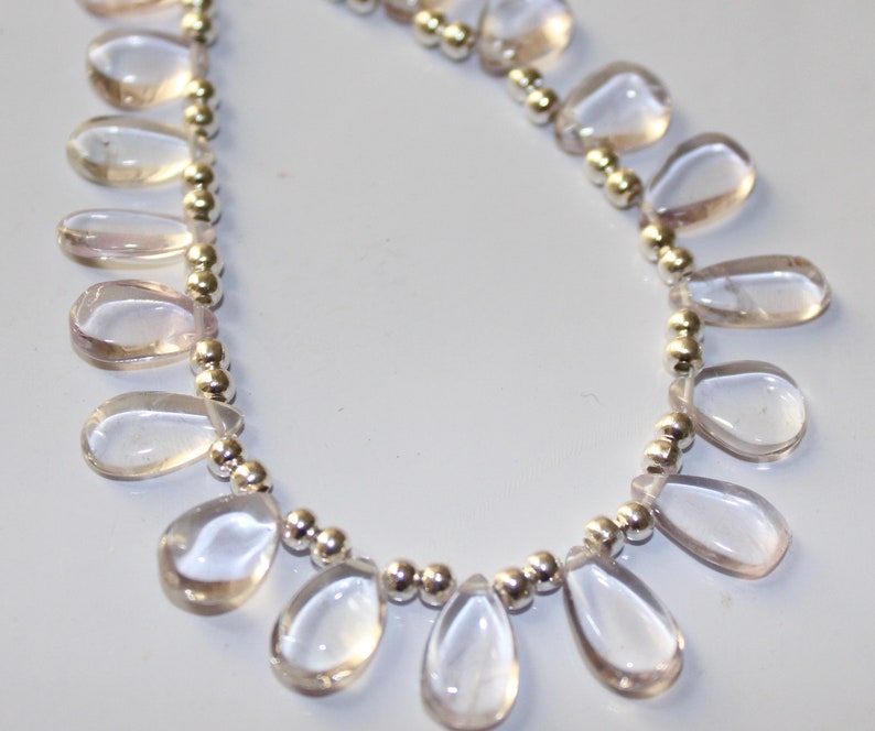 6x11.5-7x12.5mm Low price M-3777 Wholesale Price 19 piece white Amethyst Smooth pear briolette Beads