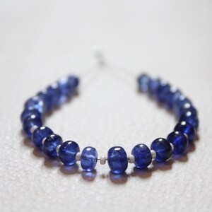 23 Picsec Blue Sapphire Roundel Shape Smooth  Beads, 5--6- MM, Blue Sapphire Beads.Blue Sapphire Beads.31.0 Crt...