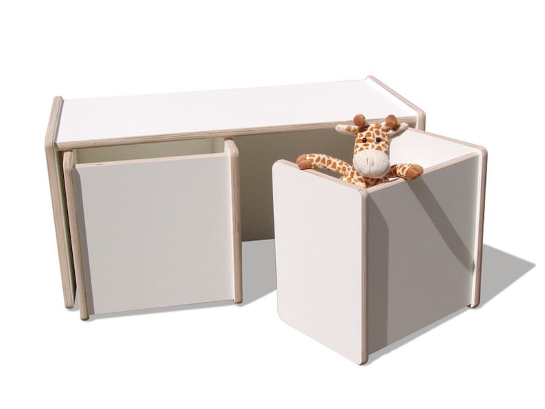 May include: White wooden storage bench with two drawers and a separate cube storage unit. A stuffed giraffe toy is peeking out of the top of the cube.