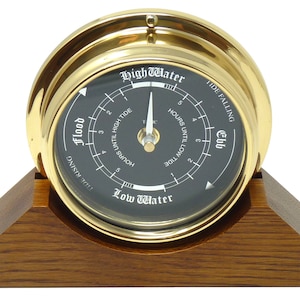 Handmade Prestige Tide Clock in Solid Brass With a Jet Black Dial, mounted on a solid English Oak Mantel/Display Mount