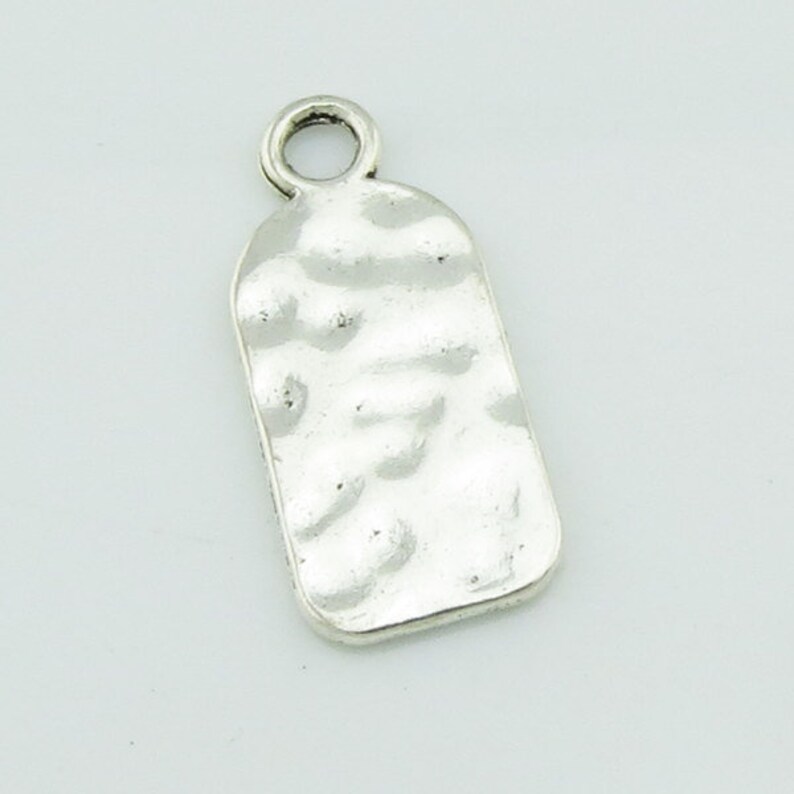 Character pendant D 12mmx 27 mm Antique Silver