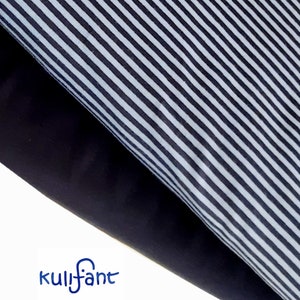 May include: Two layers of fabric are shown, one with a pattern of thin vertical black and white stripes and the other a solid dark black colour. The blue text kulifant is printed in the lower left corner of the image on a white background.