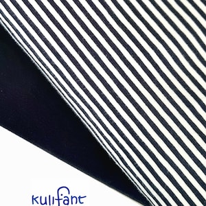 May include: A piece of fabric featuring a pattern of thin, dark navy blue and white vertical stripes, folded over to reveal a solid dark navy blue underside. The word kulifant is printed in blue text at the bottom left corner of the image.