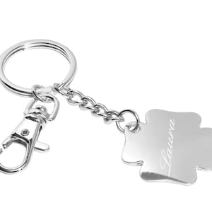 Design keyring cloverleaf silver plated lucky charm pendant made of metal silver shiny four leaf clover New Year&#39;s Eve