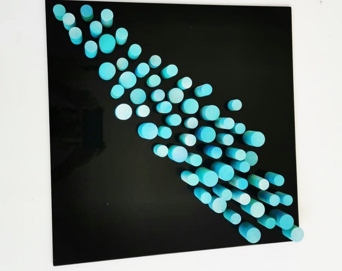 Sculpture wall art, 3D art. Different wood wall art in bold colors. Blue and turquoise dowels . Modern design in black acrylic glass base.©