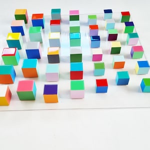 Wood wall art. Hand painted wood cubes with resin on top face. Fun and vibrant piece of art, unique and different artwork. Geometric art ©