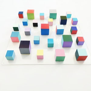 Wood wall art in bold colors, happy 3d art . Modern, vibrant wood sculpture. Geometric wall art. © Wooden wall decor. had painted cubes