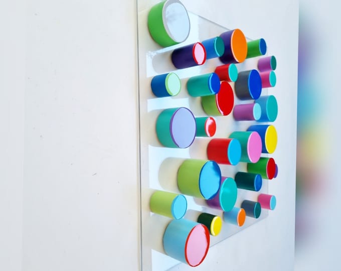 Hand painted cylinders with different heights and sizes. Wood wall wall art in happy colors with resin finish on top. . 3d wall sculpture ©
