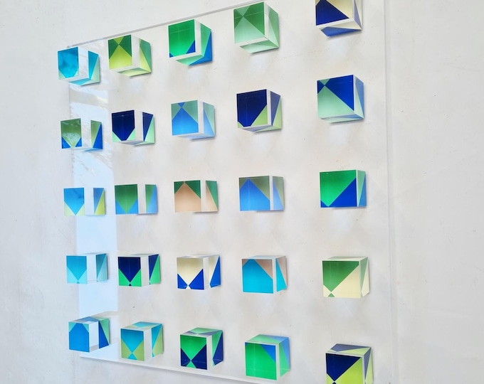 3d Wall art, Transparent acrylic cubes hand painted in shades of blue, green and soft yellow. On a base of acrylic, perspex, lucite panel