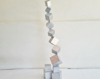 Wood art sculpture. Silver art. Colored cubes, perfect design for modern decoration © 3d art. unique and impressive art. Modern design