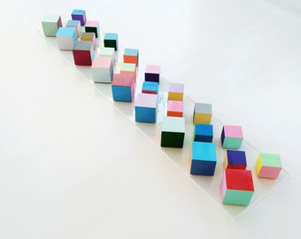Wood cube wall art. Can be hung vertically or horizontally. © Original, colorful modern wood wall art. Rectangular, long, narrow mosaic