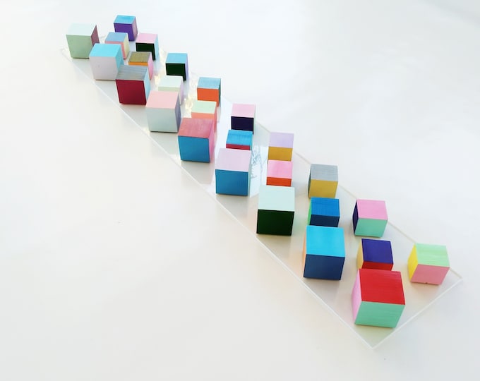 Wood cube wall art. Can be hung vertically or horizontally. © Original, colorful modern wood wall art. Rectangular, long, narrow mosaic