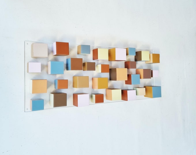 Wood cube art in neutral colors. Hand painted 3d wooden blocks with layer of resin on the top face. Wood sculpture artwork on plexi panel©