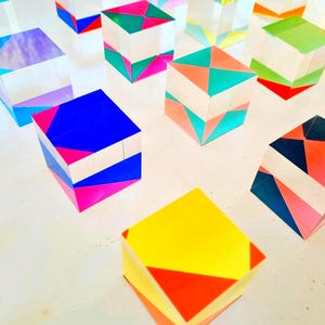 Packs of hand painted 3d wall art transparent acrylic cubes with bright colors. Choose the number of cubes and colors. Pop Wall sculpture