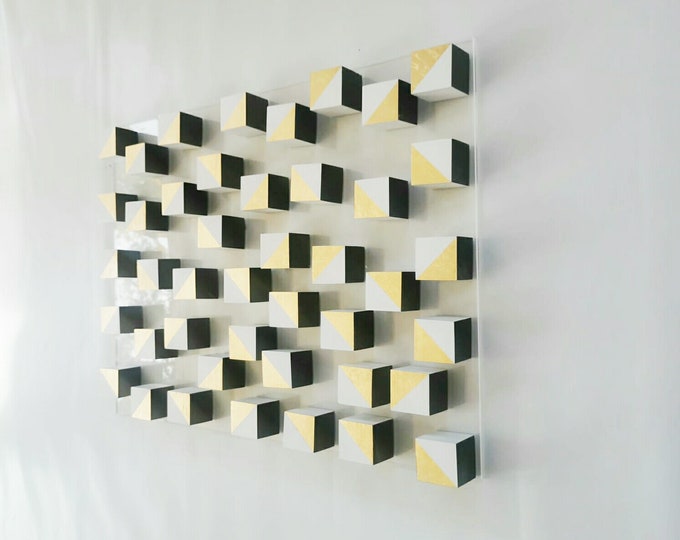 White and gold wood wall art. 3D art. Modern and geometric wall decor. Gold leaf, Home decoration and 3d installation. Sculpture wooden art