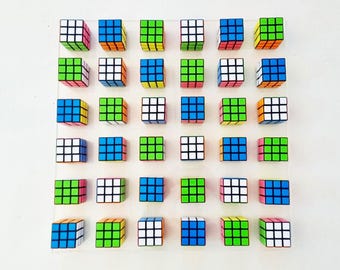 Unique Rubik's Cube Wall Art. Interactive Puzzle Sculpture. Retro 80s Toy Inspired Decor. Colorful Geometric Display ©