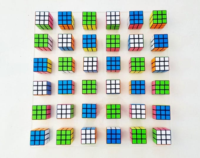 Unique Rubik's Cube Wall Art. Interactive Puzzle Sculpture. Retro 80s Toy Inspired Decor. Colorful Geometric Display ©