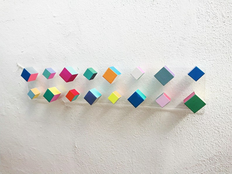 Long and narrow wood wall art.© Floating and transparent base. Etsy