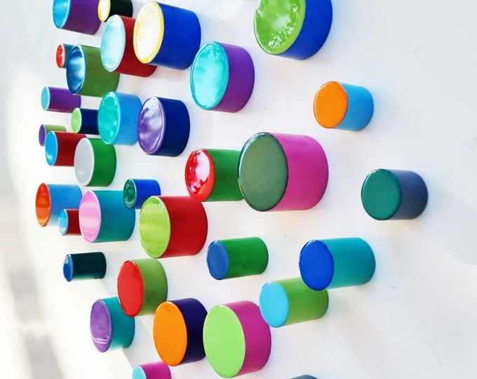 PACKS of hand painted colored cylinders with high quality,shiny epoxy resin front face.Choose the number of Self install wall art Cylinders©