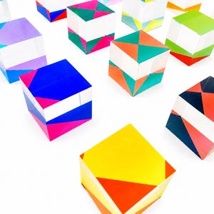Packs of hand painted 3d wall art transparent acrylic cubes with bright colors. Choose the number of cubes and colors. Pop Wall sculpture