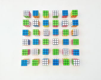 Magic cube puzzle wall piece Unique Rubiks Cube wall art. ©. Original retro vintage toy Rubik cube art piece. 80s nostalgia puzzle picture