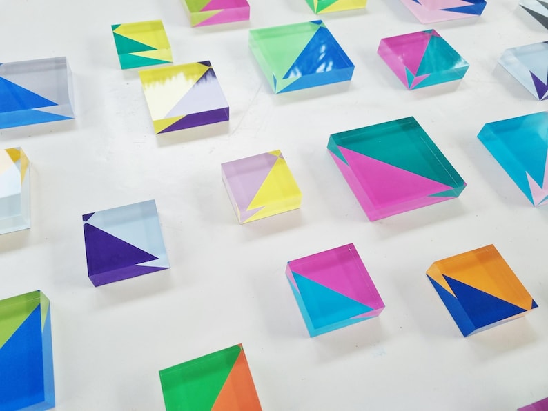 Hand painted transparent acrylic blocks.