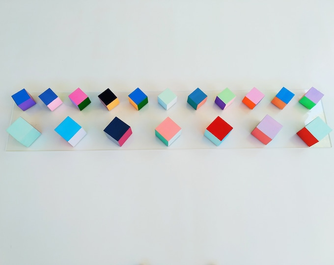 3D Wood cubes ©, hand painted in bright colors. Perfect for hanging in elongated spaces like pillars, columns, beams. sculpture, modern art.