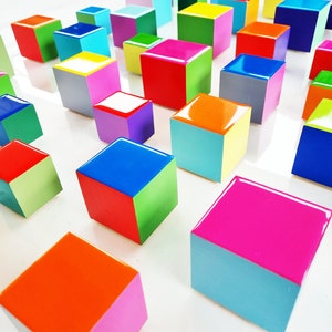 PACKS of hand painted colored wooden cubes with high quality,shiny epoxy resin front face.Choose the number of Self install wall art cubes ©