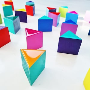 PACKS of hand painted colored triangles with high quality,shiny epoxy resin front face.Choose the number of Self install wall art triangles©
