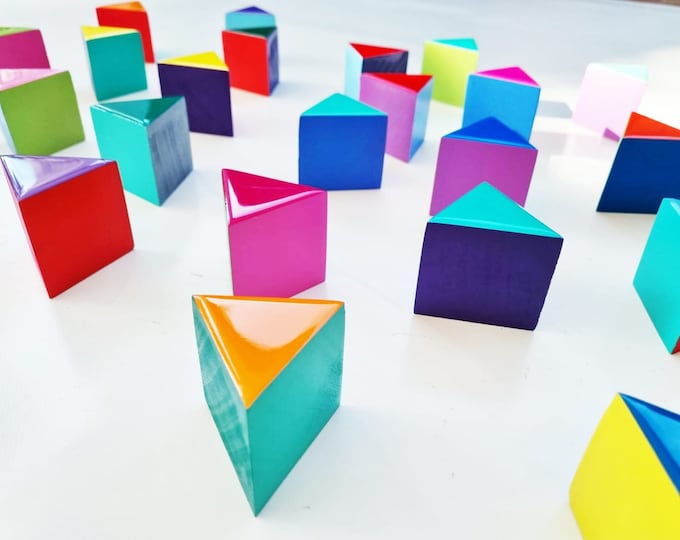 PACKS of hand painted colored triangles with high quality,shiny epoxy resin front face.Choose the number of Self install wall art triangles©