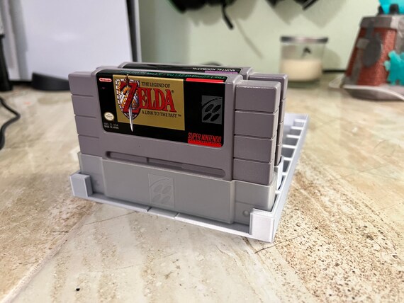 Super nintendo game holder deals