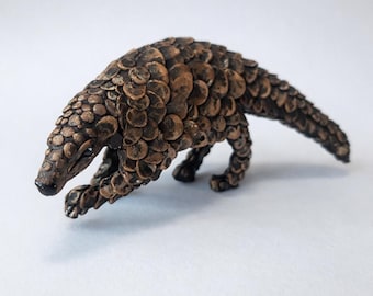 Escultura de figura de pangolín